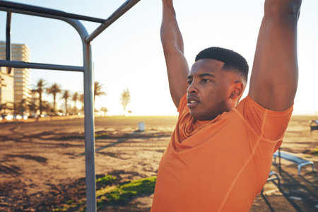 Fitness, pull up and monkey bars with black man in park for workout equipment, challenge or athlete....