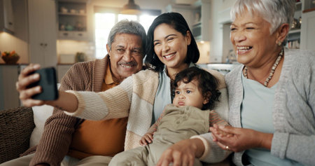 Selfie, woman and senior parents with baby bonding together on a sofa for relaxing at home. Happy,...