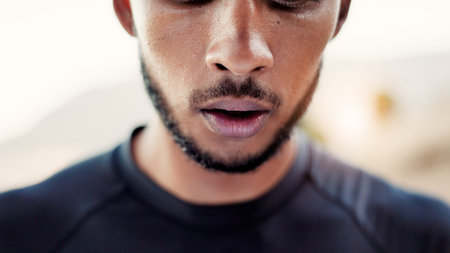 Tired, mouth and man outdoor for fitness, workout or wellness training in morning. Breathe, fatigue and exhausted male athlete with break for cardio, exercise and challenge activity for runner