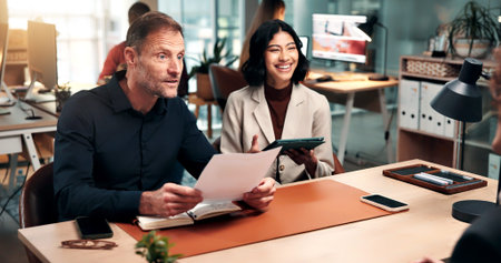 Tablet, recruitment and business people with candidate in office with notebook for interview process. Document, onboarding and applicant with happy HR panel for meeting, job offer and resume review