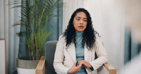 Sad, woman and anxiety in clinic with therapy appointment, overthinking or healing for mental health. Counseling, patient and nervous person with depression, rehabilitation and help for psychology.