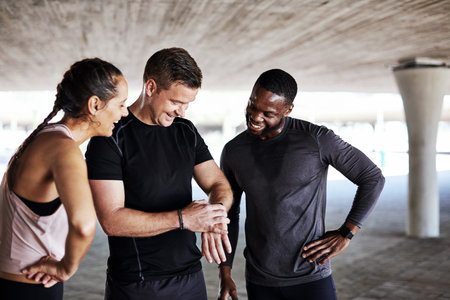Runner, smile and smart watch with people in city for workout team, health and training discussion. Running group, conversation and timer with exercise club for athlete friends, fitness and support