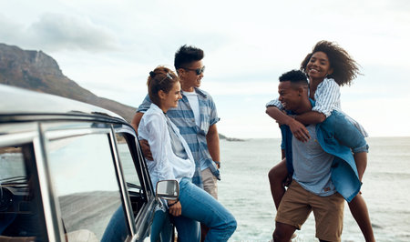 Piggyback, road trip and talking with people on coast together for getaway, holiday or vacation. Conversation, car and travel with couple of happy friends outdoor on shore for adventure in summer
