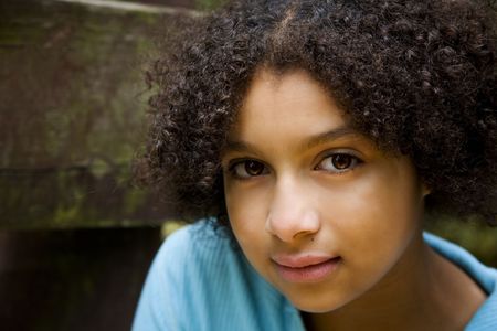 sweet expression on this pretty biracial girlの写真素材