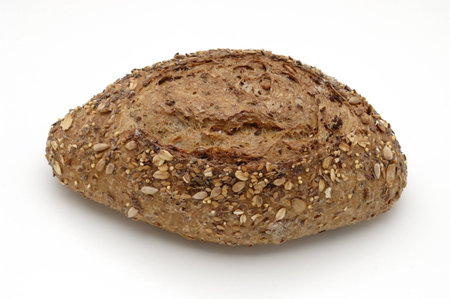 Bread over whitw background. Cereals.