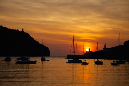 A panoramic view of Soller taken from the lighthouse of this town during the sunsetの写真素材
