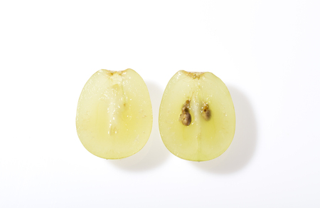 open ripe grape on a white backgroundの写真素材