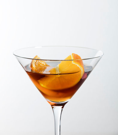 classic vermouth red with orange slice on a white background