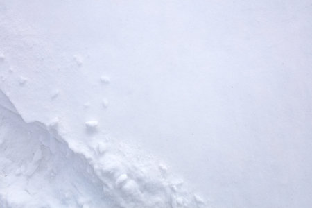 clean snow texture in a bright and sunny day