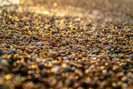 Beach sand photographed at sunset