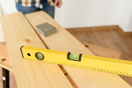 Level on workbench. High quality photo.