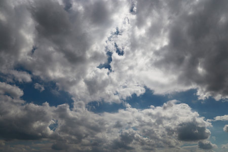 The blue sky with clouds a background