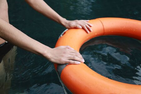 Handle life Buoy in the poolの写真素材