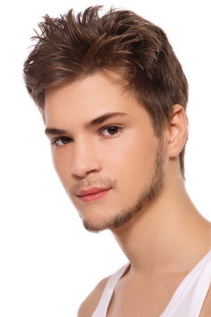 Portrait of young handsome man on white backgroundの写真素材