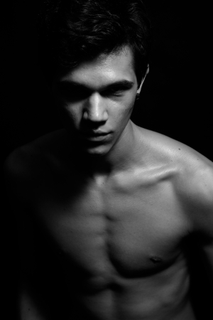 Black and white shot of young handsome sexy man with naked torsoの写真素材