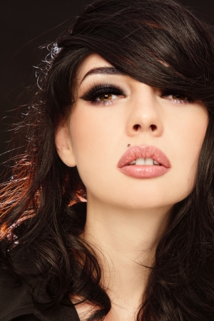 Portrait of young beautiful sexy woman with stylish make-up, focus on eyesの写真素材