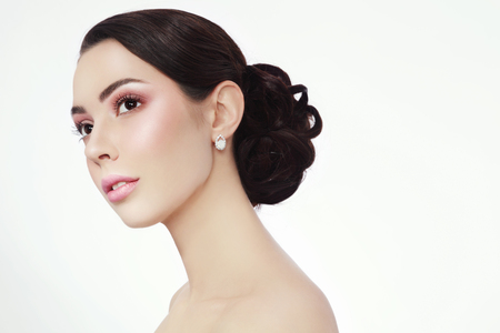 Portrait of young beautiful woman with stylish make-up and prom hairdoの写真素材