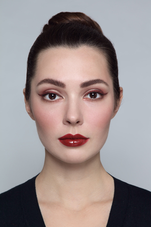 Young beautiful woman with stylish cat eye make-upの写真素材