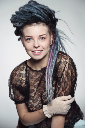 Young beautiful happy smiling sexy girl with dreadlocksの写真素材