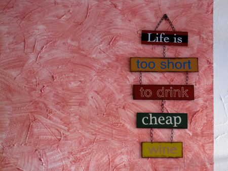 Colorful wall decoration from cafes,bar with inscriptionの写真素材