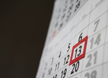 Red square reminder on calendar on friday 13th|unluck|bad luck|superstitionの写真素材