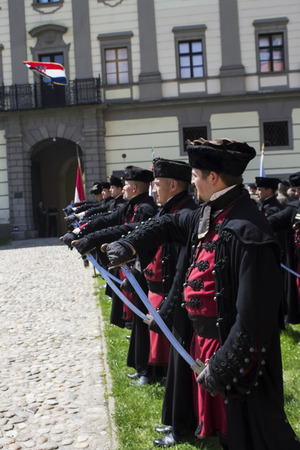 Cakovec, Croatia - April 28, 2018 : Zrinski guards with a black,traditional military uniform pulling out swords on festのeditorial素材