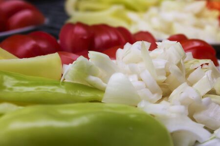 Close Up of fresh cutted vegetable salad on the white plateの写真素材
