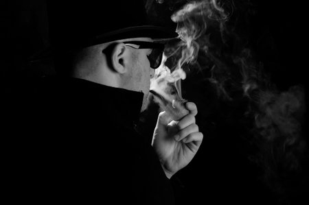 dark pipe smoke - self portraitsの写真素材