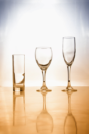 Three different kinds of drinking glass portrait in vintage colors creative filterの写真素材