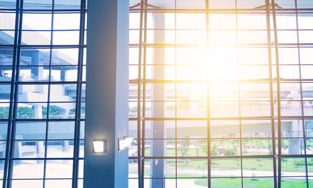Sunlight over glass windows in an airport