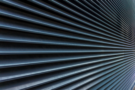 Striped lines of metallic surface in diagonal perspective, abstract backgroundの写真素材