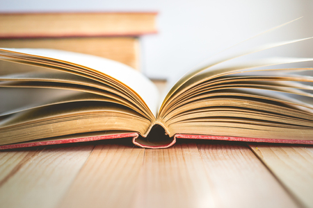 Close Up Open book and stack of books with copy space in relaxation and cozy mood, Image for education and brightness  conceptの写真素材