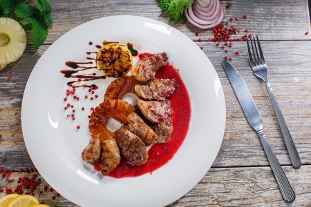 meat stew with pineapple flavored sauce and rosemaryの写真素材