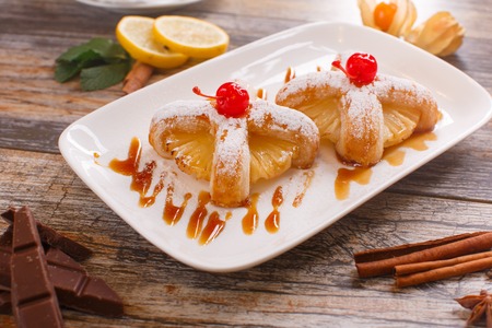 Baked buns with a cherry and pineapple top vewの写真素材