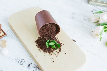 mocha mint coffee and milk foam,Peppermint mocha latte and dry flower with white pot on white backgroundの写真素材
