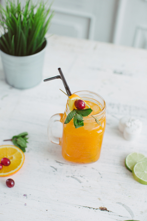 Sangria with oranges and strawberries copy space white backgroundの写真素材