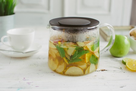 Fresh fruit tea mint apples orange healthの写真素材