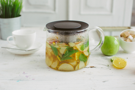 Fresh fruit tea mint apples orange healthの写真素材