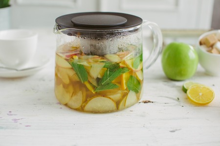 Fresh fruit tea mint apples orange healthの写真素材