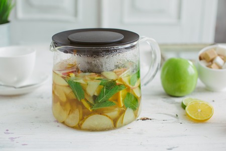 Fresh fruit tea mint apples orange healthの写真素材