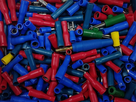 many colourful plastic tubes in boxの写真素材