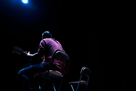 man playing guitar