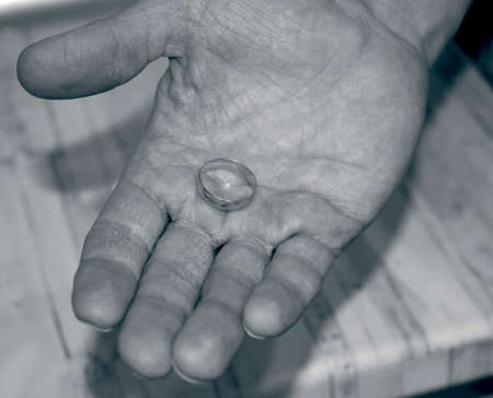 hand of the person with wedding ringの写真素材