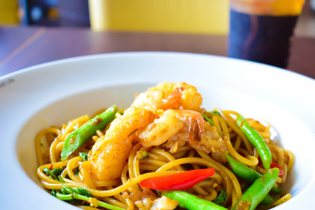 Seafood spaghetti with spicy basil sauceの写真素材