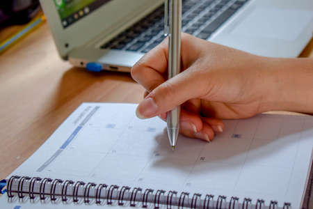 Appointment note on calendarの写真素材