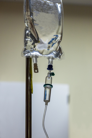 Intravenous bag on drip stand.の写真素材