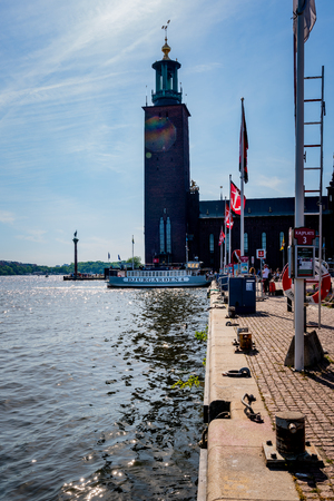 STOCKHOLM, SWEDEN - MAY 26, 2018: Profile view of Stromma KanlalbolagÂ´s  city steam ship ferry with passengers berthing the quay in Stockholm Sweden May 26, 2018.のeditorial素材