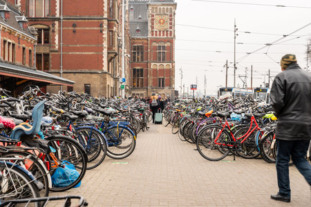 AMSTERDAM, NETHERLANDS - NOVEMBER 22,  2018: Outdoor perspective view of a large bicycle parking...