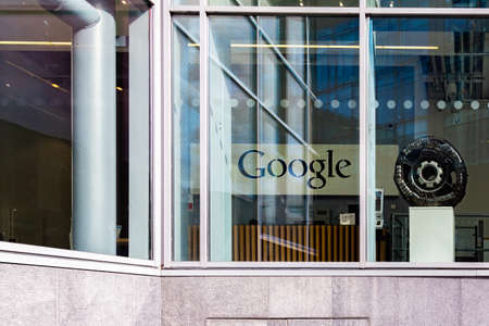 DUBLIN, IRELAND - APRIL 21, 2016: Outdoor street view of GoogleÂ´s Dublin office reception with Google logo seen through a window in Dublin Ireland April 21, 2016.のeditorial素材