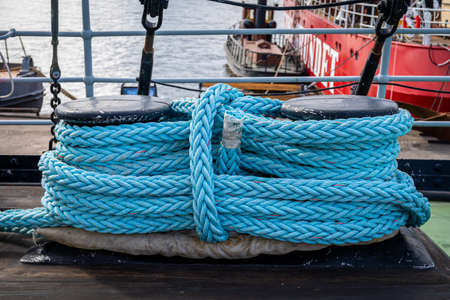 STOCKHOLM, SWEDEN - JULY 20, 2021: Closeup horizontal view of a massive blue rope knot outdoor on deck on the ship Sankt Erik. Public and free entry. Stockholm Sweden July 20, 2021.のeditorial素材